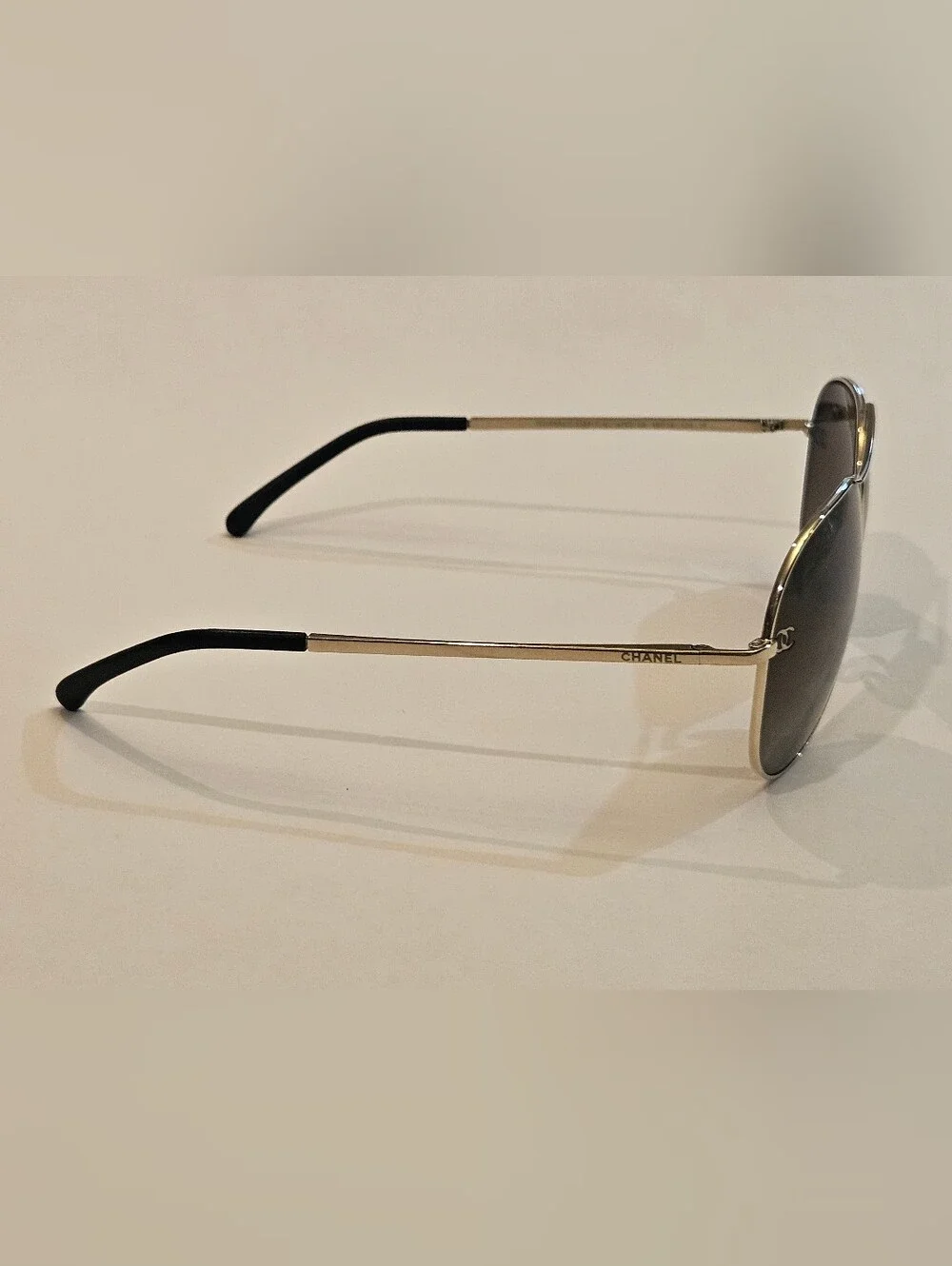 Chanel 4189-T-Q Titanium Polarized Aviator Sunglasses GoldThese are authentic